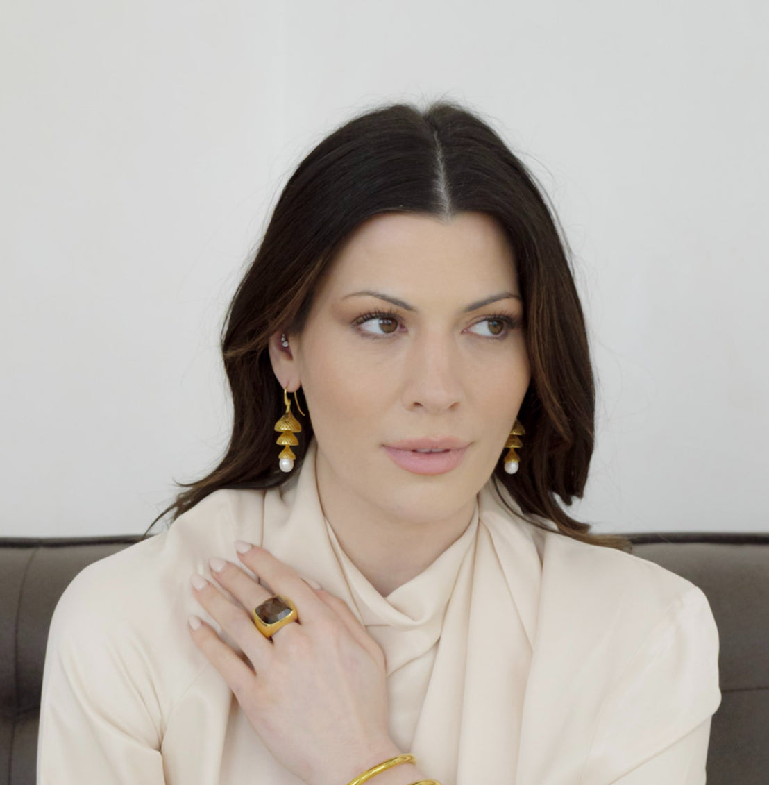 Gold statement earrings by JoJo Harris