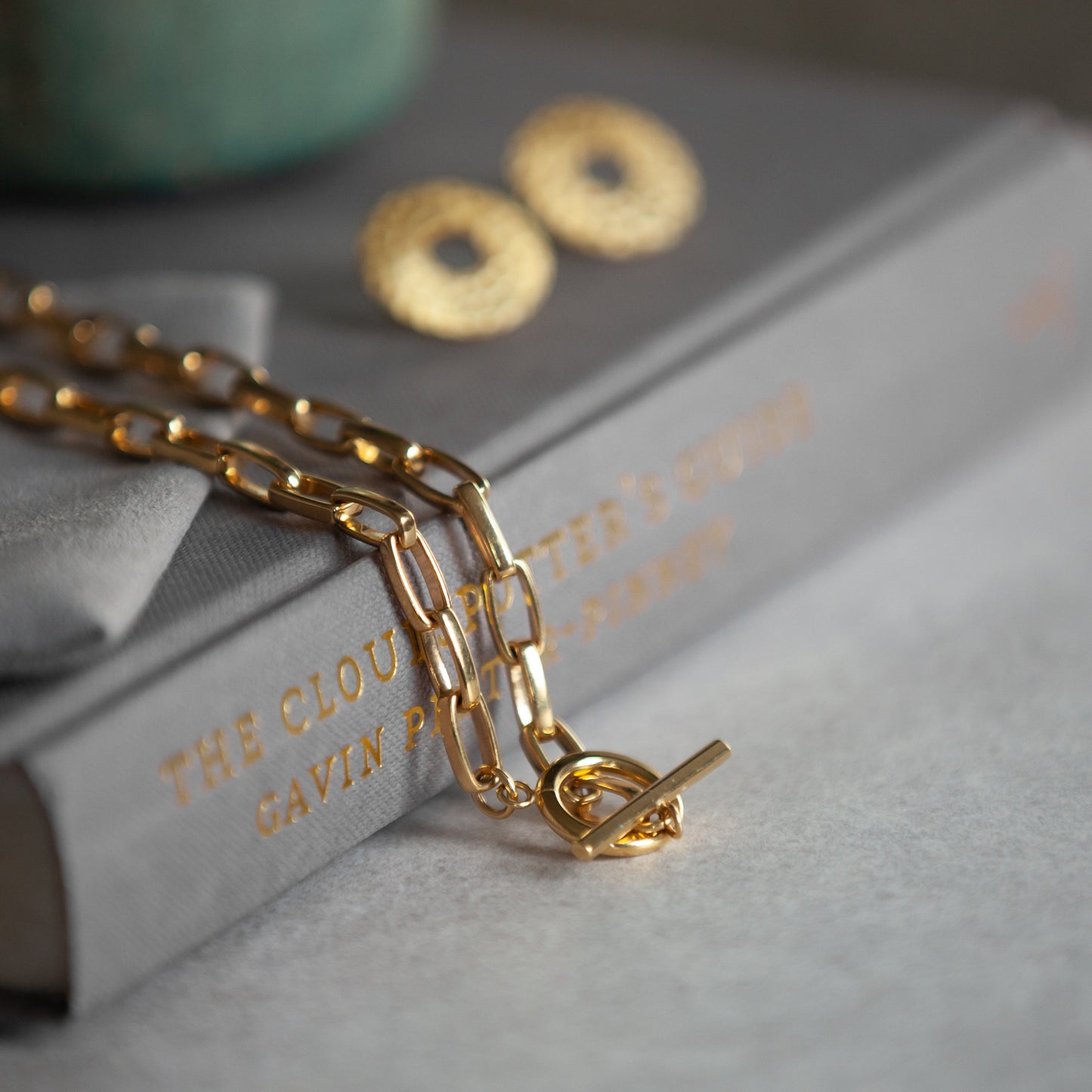Lee gold necklace styled with Donna gold earrings